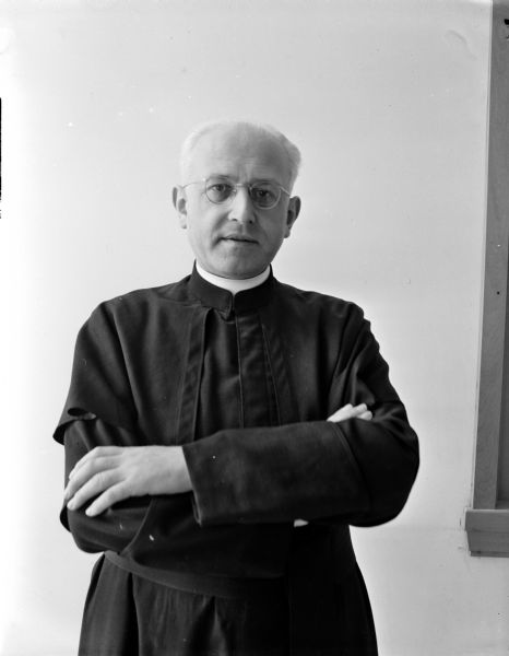 Portrait of the Reverand Otto Boenki, one of the nine priests on the staff of of the new Queen of Apostles Pallottine Seminary, located at 5810 Cottage Grove Road.