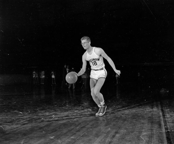 Portrait of unidentified University of Wisconsin basketball player #18.