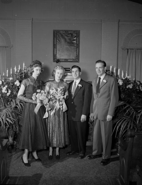 Bride Nancy E. Smith and Groom Ralph J. Simeone with Maid of Honor Ann Murphy and Best Man Robert H. Linn pose for a portrait at Westminster Presbyterian Church.