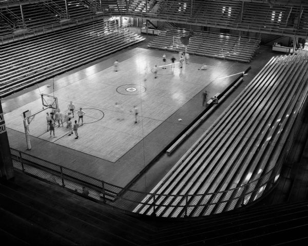 Elevated view of the basketball court and new bleachers in the University of Wisconsin Fieldhouse.