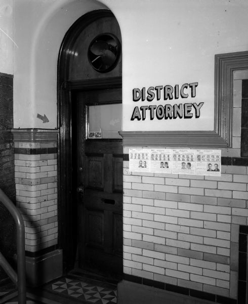 The door to the Dane County District Attorney's office. District Attorney Robert W. Arthur is having the door examined for fingerprints after his claim that burglers removed some important materials from his office files.