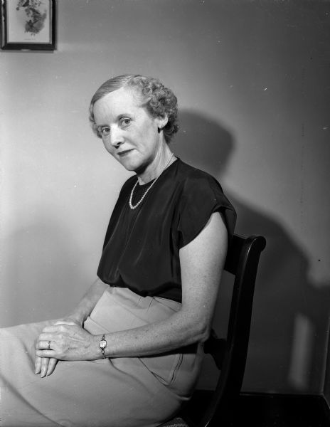 Mrs. A.R. (Pearl) Jennings of 2901 Street posing sitting for a portrait. She was recently appointed as chairman of the Zor Shrine auxiliary for 1950.