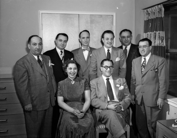 National officers of UNICO (Italian-American Service Organization) at the national meeting at the Edgewater Hotel. Standing, left to right, are: Theodore Mazza, Milwaukee, National Secretary; Louis Panella, Milwaukee, National Expansion Director; Dr. Henry Finell, Columbus, Ohio, National Vice-President; Matt Marelli, St. Paul, Minnesota, National Vice-President; William C. Davini, St. Paul, Minnesota, former National President; and Joseph Bruno, Madison, Host Chapter President. Seated are: Charlotte Navarra, Milwaukee, National Historian; and William Calvano, Milwaukee, National President.