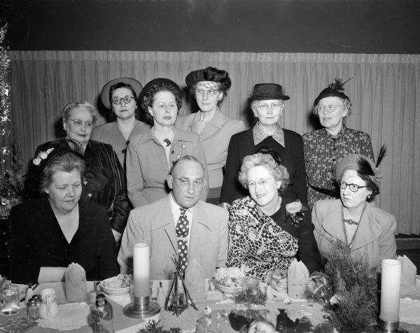 Six members of the Wisconsin division of the American Association of Nurse Anesthetists who have completed 25 years of service in the field of anesthesia were honored at a banquet in the Hoffman House Saturday night.
Shown seated left to right are: Florence McQuillan, Chicago, executive secretary, American Association of Nurse anesthetists; Dr. J.A. Hurlbut, Jackson clinic, toastmaster; Rosella Crotty, president of the Wisconsin association; and Mary Donovan, Wauwatosa, 25-year member.
Standing are Mrs. Jessie Opdale, Oshkosh, 25-year member; Mrs. Leone Higgins, Madison, chairman of the arrangements committee; and Mabel Johnson, Sheboygan; Mrs. Myrtle Hepp, Milwaukee; Sigrid Esval, Eau Claire; and Julia Campbell, Milwaukee, all 25-year service members.
