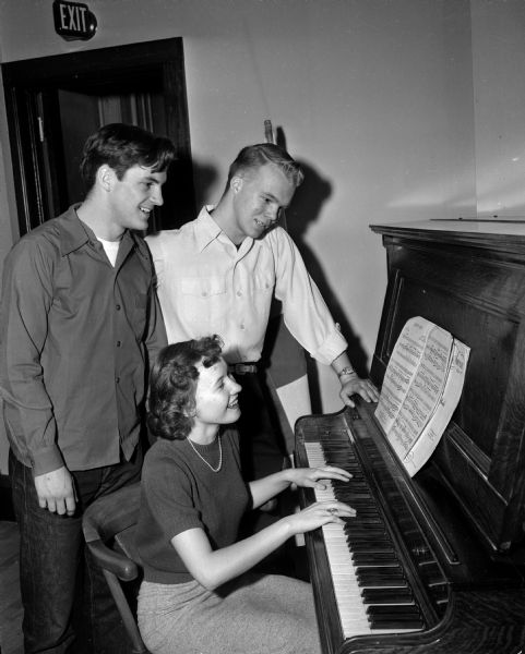 Members of the Junior Red Cross prepare for a variety show at Tomah Veterans Hospital. They are, from left to right: Bob Carpenter, Dick Feldt, and Lois Brustman.