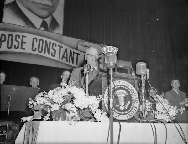 President Harry S. Truman is shown speaking at the University of Wisconsin-Madison Field House. He was in Madison to be present at the laying of the cornerstone of the CUNA Filene House, 1617 Sherman Avenue.