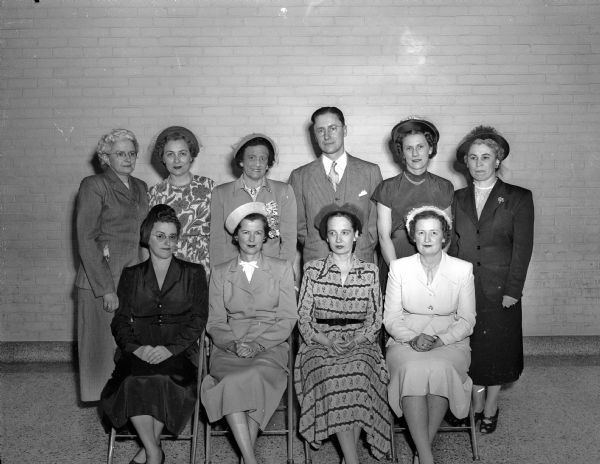 New and retiring officers of the Madison Council of Parents and Teachers are pictured. In the first row, left to right, are: Mrs. Walter Barr, vice-president for the suburban schools; Mrs. John (Devota) Meehan, vice-president for the parochial schools; Mrs. J.H. (Virginia) Gieselman, president; and Mrs. Norman(Charlotte) Madding, vice-president for the public schools.<p>In the second row are: Mrs. John (Erma) Lonergan, retiring secretary; Mrs. Hollis (Maxine) Toynton, retiring treasurer; Mrs. E.K. (Flora) Steul, retiring president; A.K. Frater, vice-president representing the faculty; Mrs. Norman (Mary) Opelt, secretary, and Mrs. H.C. (Isabelle) Kruse, treasurer.