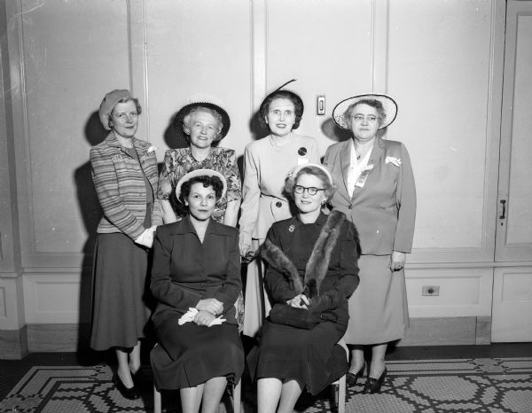 Group portrait of newly-elected officers of the Wisconsin Council of Catholic Women. Seated, left to right: Mrs. Frank Morrow, Eau Claire, corresponding secretary; and Mrs. R.A. Buckley, Eau Claire, president. Standing: Mrs. Gerald J. Boileau, Wausau, auditor; Mrs. Raymond T. Stark, Milwaukee, recording secretary; Mrs. J. Hubert Shaughnessy, Green Bay, first vice-president; and Mrs. E.J. McCabe, Janesville, treasurer.