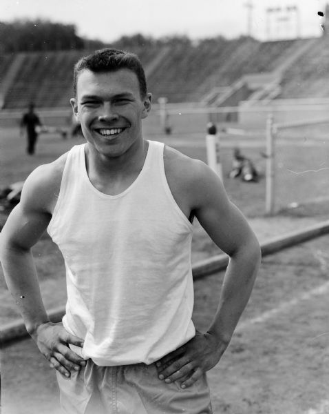 Outdoor portrait of Jerry Witt of Marshfield, who won both the Class A 100 and 200 yard dash at the WIAA prep track meet held at Camp Randall on the University of Wisconsin campus.