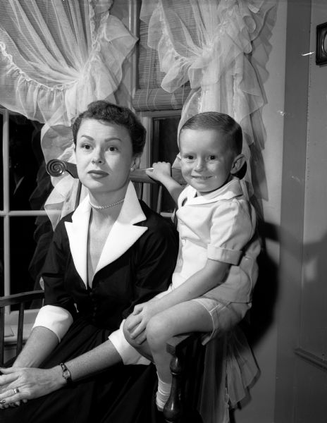 Portrait of Mrs. Frederick F. Kessenich with her 3 year old son Peter.