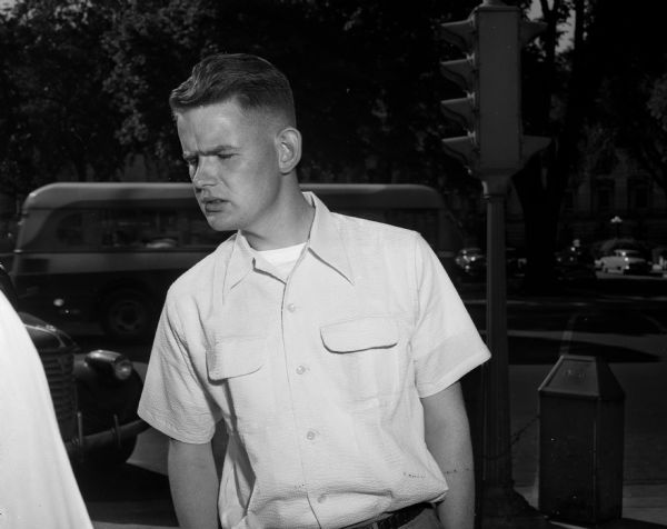 James H. Roberts, age 22, member of the 32nd Division Band, during on-the-street interview about the Korean War by journalist John Prindle.