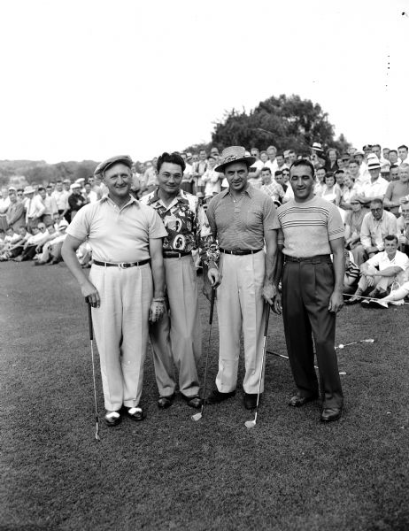 Group portrait of four golfers who took part in a golf exhibition at Nakoma Golf Club.  Pictured from left to right are:  George Vitense, Nakoma, professional; George Schneiter, Ogden, Utah, professional; Sammy Snead, White Sulfur Springs, professional; and Steve Caravello, Nakoma amateur.