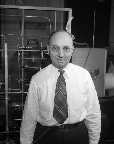 Portrait of Professor Joseph Hirschfelder, University of Wisconsin chemist. He also is project director for the U.W. Naval Research Laboratory, member of the U.S. Atomic Energy Commission, and chair of the Board of Editors for a recent publication, "Effects of Atomic Weapons."