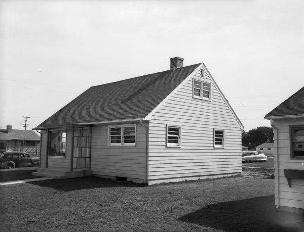 Photograph of model home #3 constructed at 201 Harding Street by A.A. Elkind & Company, builders and developers, 1940 Winnebago Street. The image appeared in an advertisement for the company.
