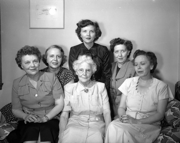 Group portrait of Mary Day and her daughters Beulah McClelland, Julia Day, Nona Kinnear, Ella Rasmussen, and Mrs. Thomas Earle.