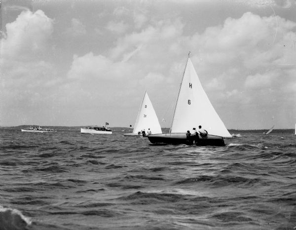 "The Albatross IV," a sailboat owned by Terry Lentz of Pewaukee, is shown with its crew during one of the races of the 49th Annual Regatta of the Inland Lakes Yachting Association.