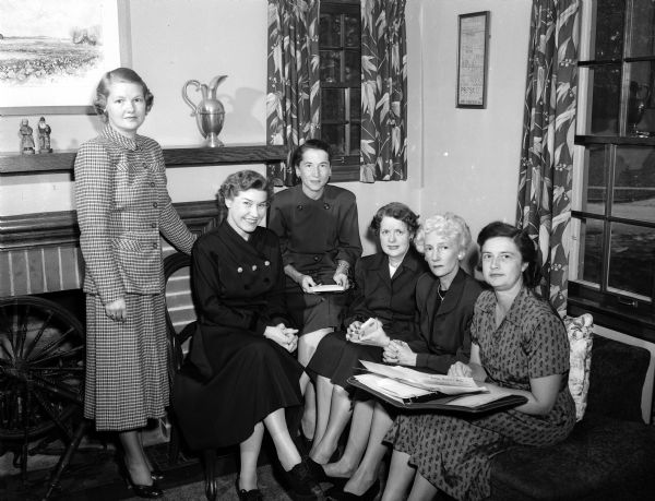 Dane County Medical auxiliary members will serve as hostesses for the annual convention of the State Medical Society of Wisconsin at Hotel Schroeder in Milwaukee. The following women will figure prominently in the convention program. From left to right: Mrs. Edward P. (Helen)Roemer, legislation chairman for the state group; Mrs. O.S. (Ottilea) Orth, president of the Dane County Medical auxiliary; Mrs. Sture A.M. (Geneva) Johnson, head of the state organization committee; Mrs. N.A. (Agnes)Hill, corresponding secretary; Mrs. Carl (Melba) Neupert, president of the state auxiliary and Mrs. B.I. (Myrna) Brindley, convention chairman.