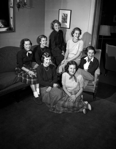 Madison pledges of the Pi Beta Phi sorority pose for a group portrait. Seated are: Jean De Young and Mary Louise Woodford. In back, left to right, are: JoAnn Gunderson, Mary Gillett, Jane Lee Gaumnitz, Barbara Mathyg, and Marita Schumpert.
