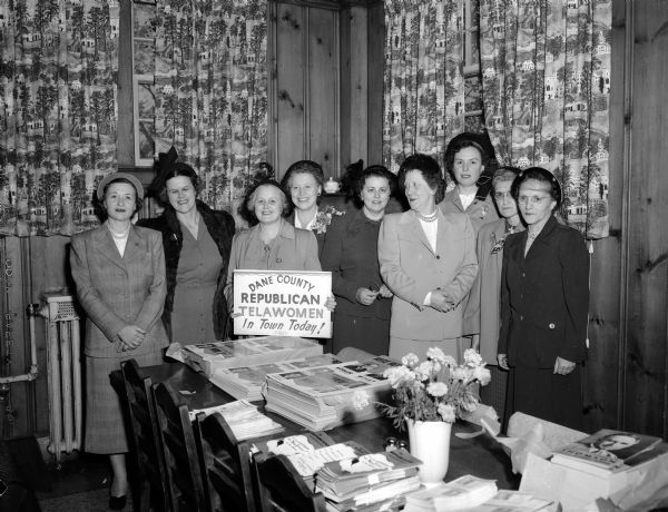 Telawomen Committee members of the Dane Conty Women's Republican club met in Madison to open their campaign efforts for the November 7th election.  Standing left to right are: Mrs. E.W.(Constance) Holmquist, Madison; Mrs. Theodore King, Mazomanie; Mrs. Harry C. Chapin, Stoughton; Mrs. Earl Siggelkow, McFarland; Mrs. Leonard Peterson and Mrs. M. T. Morris, Mt. Horeb; Mrs. E. O. (Jean) Rosten, Madison; Mrs. Arthur Argue, Belleville; and Mrs. L.A. Stohlen, Sun Prairie.  Mrs. Holmquist and Mrs. Rosten were co-chairmen of the Telewomen Committee, organized last January.


