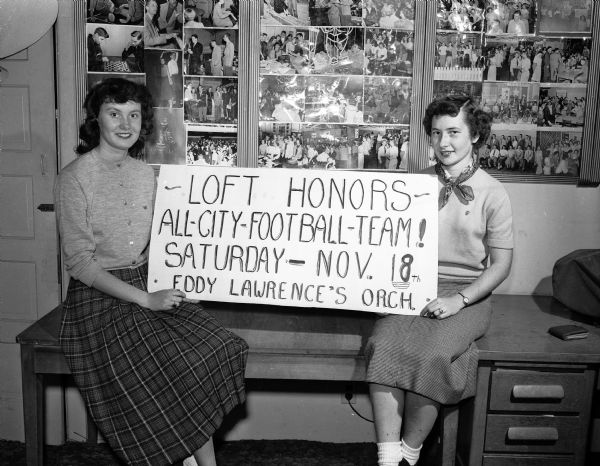 The Loft and the Madison Youth Council sponsored a dance in honor of the All-City Football Team for the purpose of collecting clothing for Korea. Shown with a poster announcing the event are, left to right: Sharon Aldrich and Carol Jeffrey, both students at Central High School.
