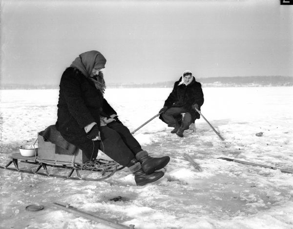 Helen Viktora and Magdalen Viktora ice fish on Lake Mendota.