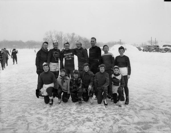 Group portrait of the boys' and girls' 1951 Madison speed skating champions in the midget, cub, junior, intermediate, and senior divisions.
