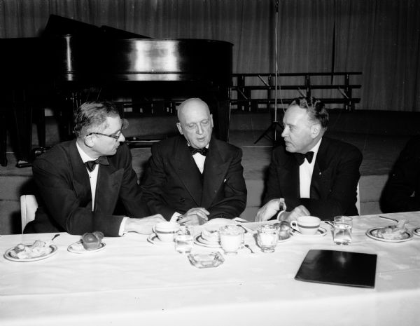 Shown at the speakers' table at the University of Wisconsin Founders' Day banquet are, (left to right): Walter Frautschi, member of the board of the Madison Alumni Club; University of Wisconsin President E.B. Fred; and Grayson L. Kirk, acting president of Columbia University and former Wisconsin political science professor, speaker.