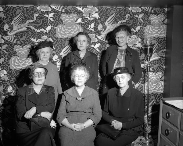 Group portrait of the members of the Wisconsin Executive Board of the Delta Kappa Gamma Education Sorority, front row, left to right: Edythe Sanderman, Menasha, vice president; Jessie Caldwell, La Crosse, president; and C. Lorena Reicher, Madison, treasurer. Standing: Bessie May Allen, Stevens Point, parliamentarian, Dr. Ella Hanawalt, Milwaukee, executive secretary and Blanche Loskinski, Mt. Horeb, president of the Madison Alpha chapter.