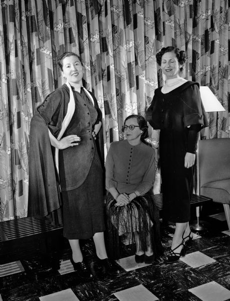 Mrs. J.J. (Helen) Sinagub (left), Mrs. Harry M. (Esther) Sweet (sitting), and Mrs. Bernard Rabinovitz, are displaying some informal clothes designed by students at the Hadassah Institute of Fashion and Design in Jerusalem.
