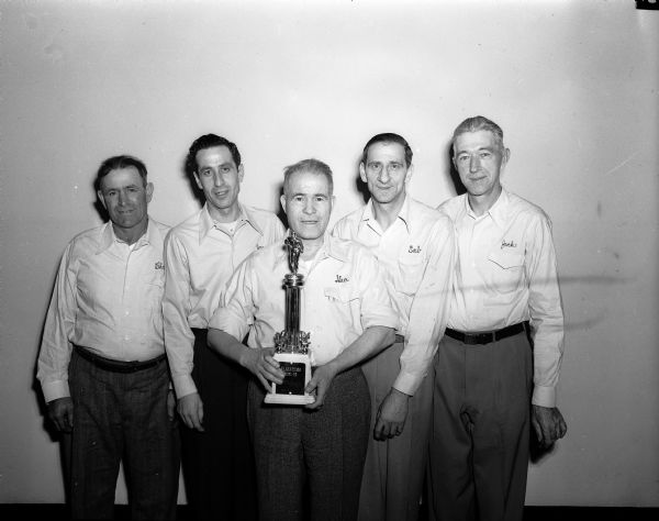 Portrait of the Plaza Commercial League championship team from George's Restaurant. From left are Charlie Bran, Joe Balisteri, George Gerothanas, Sal Maglio, and Jack Curtis.