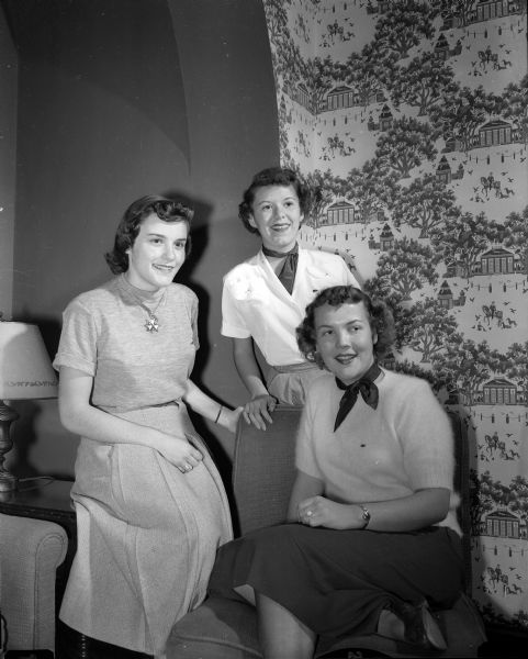 Three new Madison pledges of the Chi Omega sorority at the University of Wisconsin pose for a group portrait. From left to right are: Jean Hendrickson, Sharon McMahon, and Marjorie Swanson.