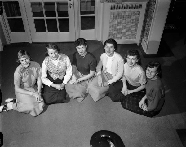 Six new Madison pledges of the Alpha Chi Omega sorority at the University of Wisconsin gather for a group portrait. From left to right are: Gail Turner, Lois Bakken, Joyce McNearney, Mary Ebling, Barbara Brunsell, and Ellen Hefty.