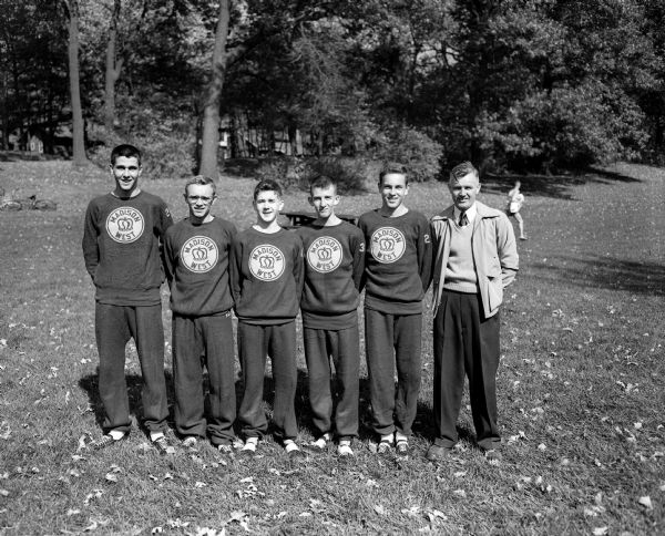 Five boys from the Madison West Cross Country team (harriers) enabled their school to win their own invitational event. Left to right are, Norman Barton, Jack Adams, Dick Merkel, Bill Marsh and Jim Henning.