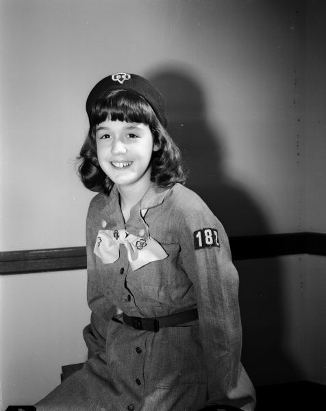 Representing the Girl Scouts is Ann Toborsky, 516 South Orchard Street, a member of Troop 182 at St. James School. More than nine hundred volunteer workers were involved in a house-to-house canvas to solicit money for the 1951-52 United Givers' Fund. The fund represents twenty-two local, state and national health and welfare agencies.