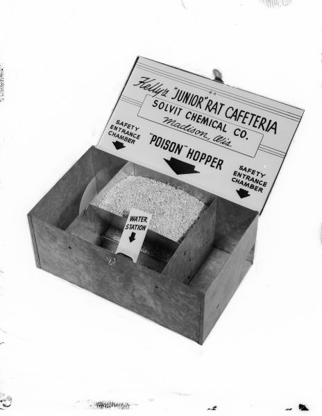 A masked negative showing a rat trap, Kelly's "JUNIOR" RAT CAFETERIA, by the Solvit Chemical Company of Madison.