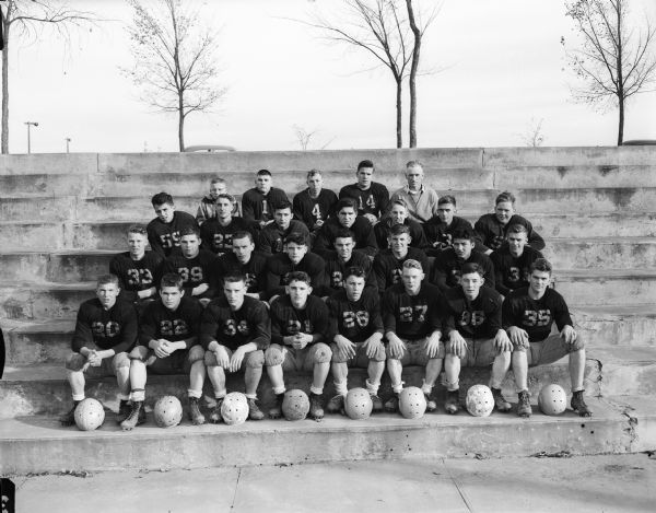 Group portrait of the Sun Prairie High School football squad, the top-ranking team in the Madison suburban league.
