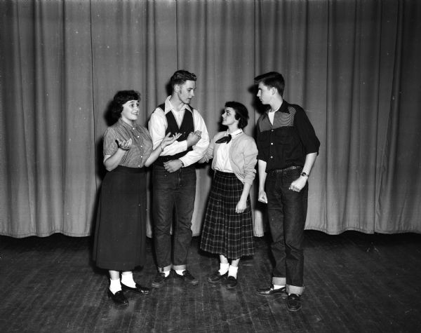 Rehearsing for East High School's fall play, "Pride and Prejudice", are (from left): Alice Ghering, Terry Howe, Shirley Jacobson, and Gilbert Splett.