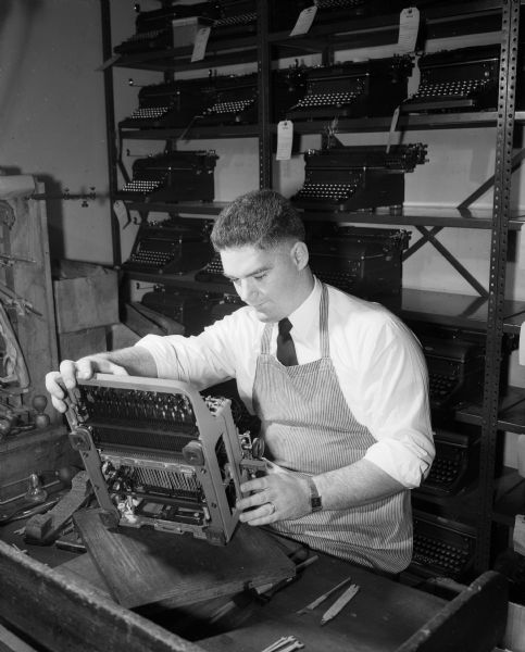 Robert Lawrence works as an apprentice mechanic at Royal Typewriter Company after his recovery from tuberculosis.