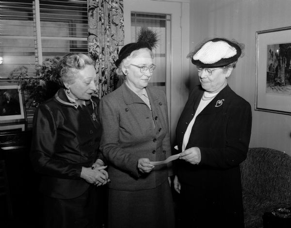 Two members of the National Council of Jewish Women present a check to furnish a room at Madison General Hospital in memory of Sarah Sinaiko.  Left to right: Rose Silverberg, Leah Rothschild, and Grace Crafts, administrator of Madison General Hospital.
