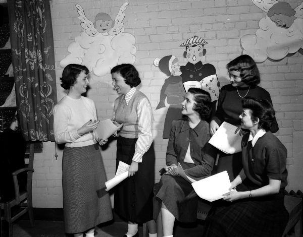 Members of Phi Beta Speech Sorority rehearse a play reading they will be putting on for patients in Madison hospitals. Left to right: Jean Day, Madison; Eve Joan Peak, Green Bay; Mary McGalloway, Fond du Lac; and Rosemary Kalfsbeck, Madison.