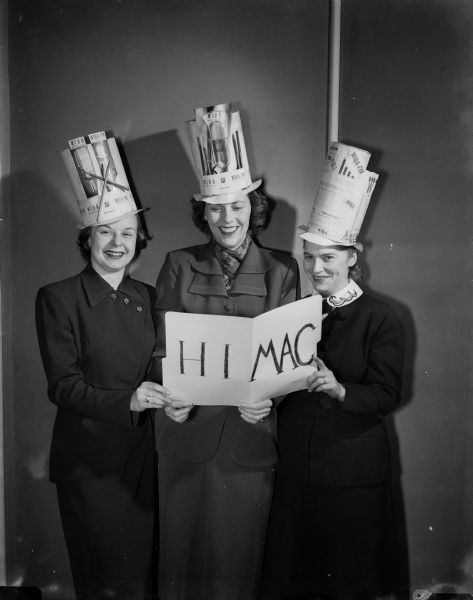 For the first time in the history of the Madison Advertising Club, the women members plan the dinner and program to be held at the Hoffman House. Hats made from materials used in their various types of advertising will be worn by the female members attending the dinner and program. Members of an auxiliary club that has a luncheon meeting on the first Friday of the month will also attend the dinner and take part in the program. Shown are three WIBA staff memebers who will form the "Hi! MAC" trio Luann Hosely, Elinore Murphy and Joyce Wickware. The guest speaker is Louise Marston, society editor of the Wisconsin State Journal.