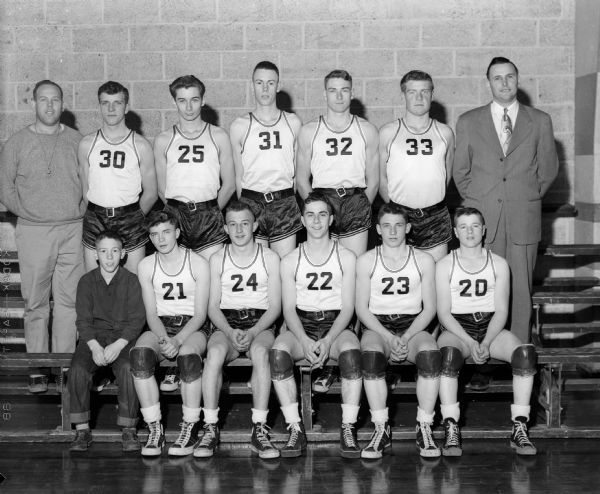 Group portrait of either the Spring Green or Muscoda Boy's High School basketball team.