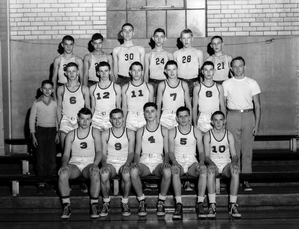 Group portrait of either Spring Green or Muscoda High School boy's basketball team.