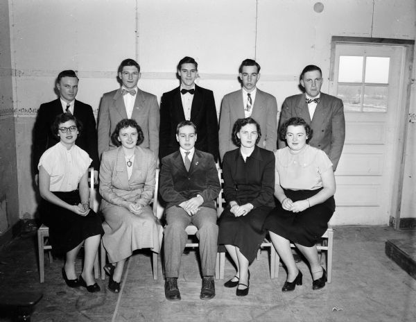 Group portrait of ten Dane County 4-H Club leaders who were named state honor achievement members for their 1951 club work. Left to right, front row: Ednabelle Barkhahn, Verona; Mary Ann Robertson, Stoughton; Mark Mergen, Cottage Grove; Judith Anderson, Bellevile; and Gladys Derr, Sun Prairie. Back row: Vernon Wiesensel, Sun Prairie; Elmer Baker, Mt. Horeb; Robert Reuter, Middleton; Donald Uphoff, Cottage Grove; and Russ Weisensel, Sun Prairie.