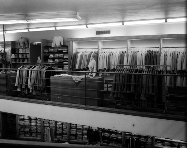 A new ladies' wear department opened in The Hub Men's Clothing Store. The new department, featuring coats, suits, dresses, and casual wear, is located on the balcony of the store at 22 West Mifflin Street and will be managed by Mrs. Marjorie Wallace Jones (not shown).