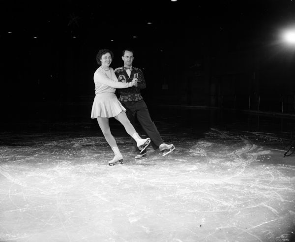 Mr. and Mrs. B. Arden and Irene Taylor, 407 West Dean Avenue, are proficient figure skaters who help in the instruction of beginning skaters and youngsters who are among the two hundred-fifty members of the club.