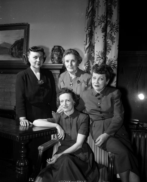 Four officers of the Bethany Group of the First University Methodist Church. Seated is Helen Curtis, president. Left to right: Ruth Bumgartner, vice president; Anne Harris, secretary; and Alice Hammes, treasurer.