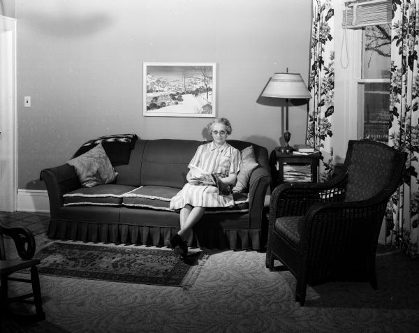 Portrait of Mrs. Arthur J. Gafke, seated in the living room of her octagon home in rural Fort Atkinson, Wisconsin.