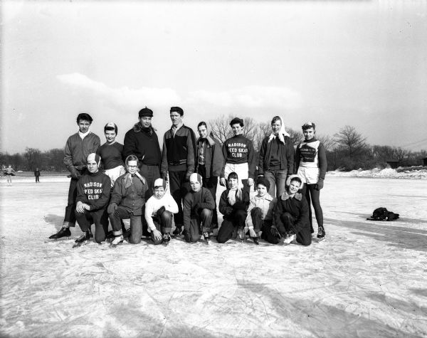 Six new records were established in the Madison speed skating finals. Pictured left to right are skaters who led their divisions in the annual city championship meet. Front row: Duane Riley, Karen Peterson, Jim Lauby, Jack Lauby, Catherine Cline, Bobby Householder and Susan Anderson. Back row: Jim Hermiston, Pat Macken, Paul Whelpley, Paul Macken, Dorothy Koltes, Ruby Corcoran, Alene Peterson and Suzanne Devine.