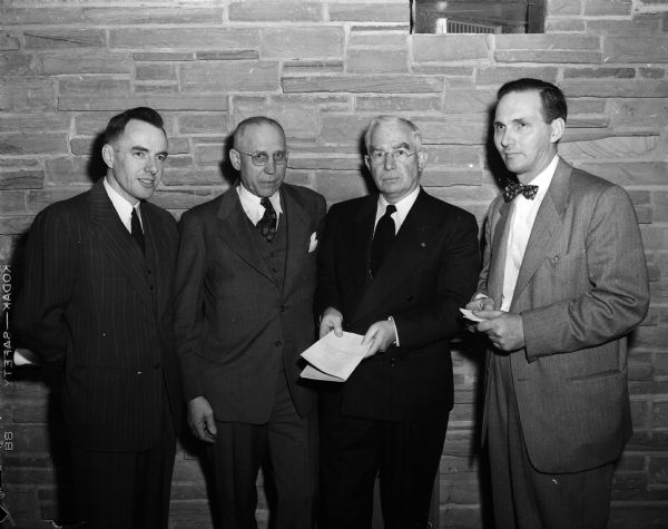 Dedication services for the new Westminster Presbyterian Church, 4100 Nakoma Road, were held at the church. Left to right are: Rev. Richard Pritchard, present pastor; Rev. Harry C. Kuhnert, a former pastor of the church; Dr. I.E. Bradfield, Waukesha, Presbyterian synod executive and James Marshall, chairman of the congregation's building committee.